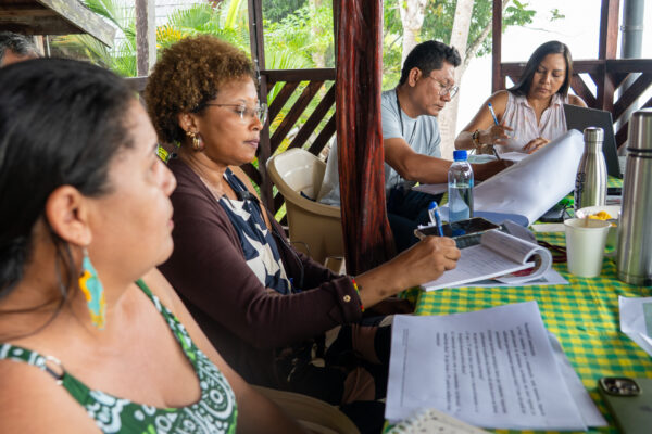 Members of the Yutzu Group during an internal session in Saamaka territory